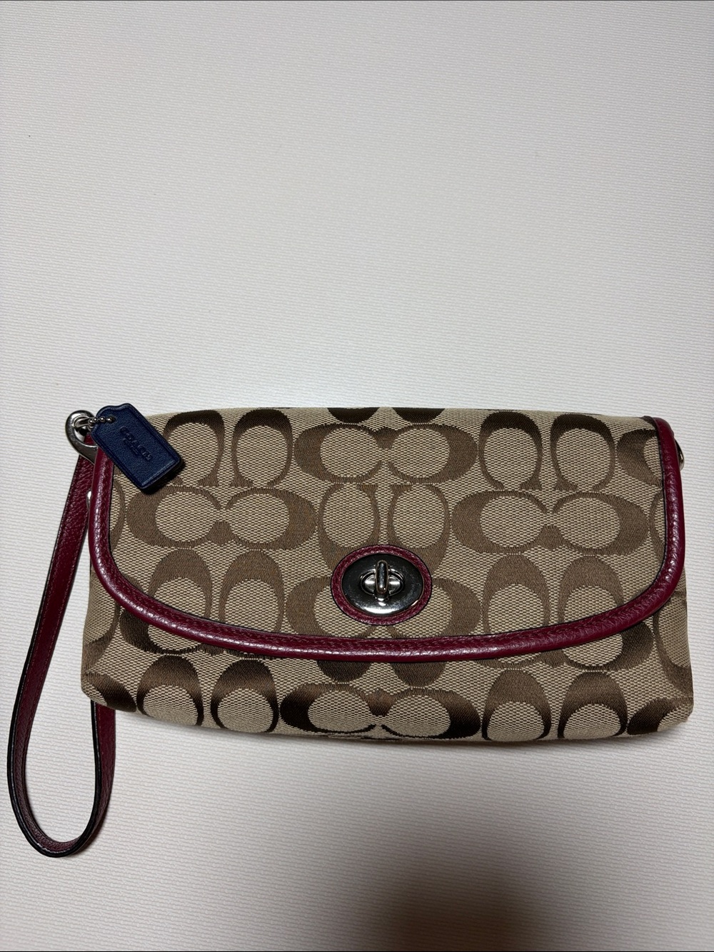 Coach Khaki Signature Canvas Wristlet with Berry Trim